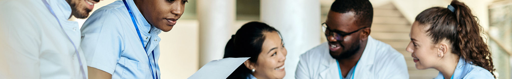 group of young doctors chatting together