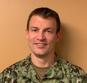 U.S. Marine posing for photo