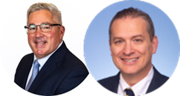 Two smling White men in business suits